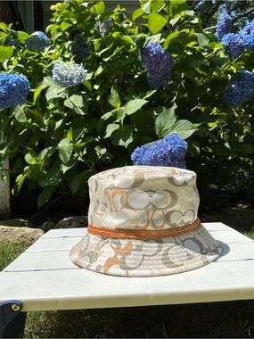 Coach Signature Print Bucket Hat in Beige/Tan